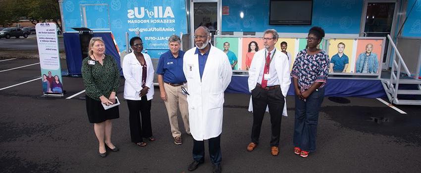 Dr. Errol Crook, center, professor and Abraham Mitchell Chair of Internal Medicine at the University of South Alabama College of Medicine, director of the USA Center for Healthy Communities, and principal investigator for the All of Us Research Program at USA, speaks at the news conference. 